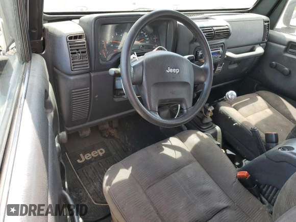 2004 Jeep Wrangler SE with VIN 1J4FA29124P796031, listed as a Copart auction lot 56875525 with 239,488 mi miles and Clean title. Bid and sale history available at DreamBid. Image 8.