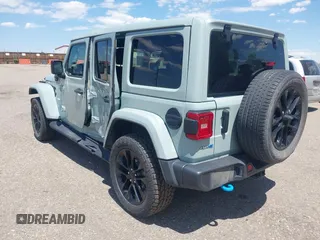 2023 Jeep Wrangler Sahara with VIN 1C4JJXP68PW627007, listed as a IAAI auction lot 42474745 with 57,912 mi miles and . Bid and sale history available at DreamBid. Image 3.