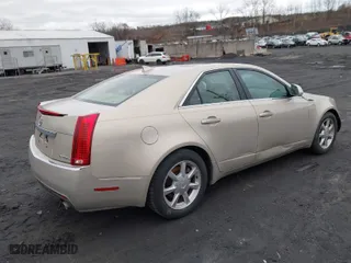 2009 Cadillac CTS AWD w/1SA with VIN 1G6DG577790121184, listed as a IAAI auction lot 41739559 with 156,379 mi miles. Bid and sale history available at carsss.com. Image 4.