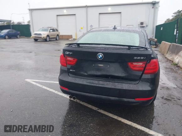 2014 BMW 3 Series 328i Gran Turismo xDrive z VIN WBA3X5C56ED556632, wystawiony jako IAAI lot #41962313 z przebiegiem 99 512 mil mil oraz . Historia ofert i sprzedaży dostępna na DreamBid. Obrazek 16.