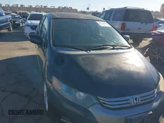 2010 Honda Insight EX with VIN JHMZE2H74AS012517, listed as a IAAI auction lot 41886588 with 227,428 mi miles and . Bid and sale history available at DreamBid. Image 6.