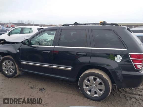2009 Jeep Grand Cherokee Limited with VIN 1J8HR58T89C541970, listed as a IAAI auction lot 41189623 with 74,161 mi miles. Bid and sale history available at carsss.com. Image 14.