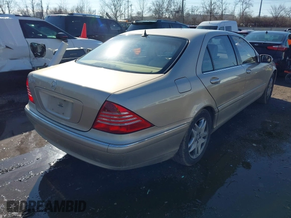 2003 Mercedes-Benz S-Class 4.3L with VIN WDBNG70J73A381880, listed as a IAAI auction lot 41547318 with 136,606 mi miles. Bid and sale history available at carsss.com. Image 4.