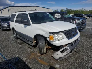2004 Ford Expedition Special Service with VIN 1FMEU15W04LA49387, listed as a Copart auction lot 52386065 with 322,325 mi miles and Salvage title. Bid and sale history available at DreamBid. Image 4.