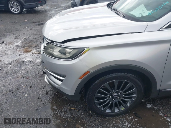 2015 Lincoln MKC z VIN 5LMCJ1A95FUJ20349, wystawiony jako IAAI lot #41695129 z przebiegiem 140 878 mil mil oraz . Historia ofert i sprzedaży dostępna na DreamBid. Obrazek 17.