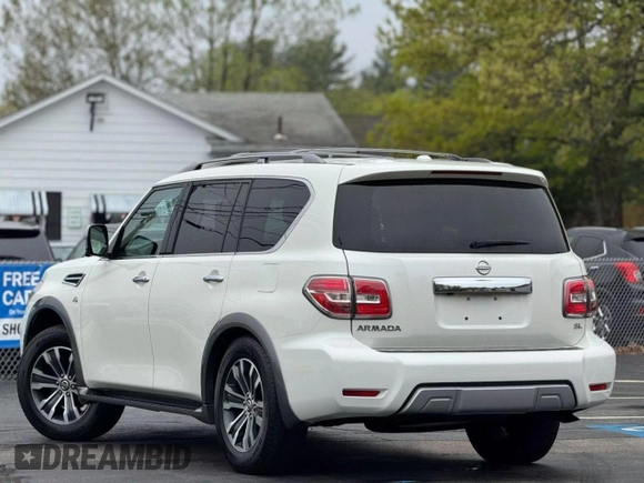 2017 Nissan Armada SV z VIN JN8AY2NC7H95049XX, wystawiony jako Copart lot #61907525 z przebiegiem 131 364 mil mil oraz Czysty tytuł • Clean title. Historia ofert i sprzedaży dostępna na DreamBid. Obrazek 3.