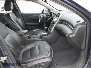 2014 Chevrolet Malibu LTZ with VIN 1G11J5SXXEF214080, listed as a IAAI auction lot 42046009 with 168,343 mi miles. Bid and sale history available at carsss.com. Image 5.