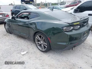 2020 Chevrolet Camaro 1LT with VIN 1G1FB1RS6L0125323, listed as a IAAI auction lot 42101034 with 124,474 mi miles and . Bid and sale history available at DreamBid. Image 3.