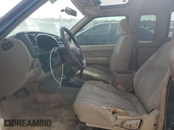 1999 Nissan Frontier XE z VIN 1N6ED26Y4XC344388, wystawiony jako Copart lot #75514124 z przebiegiem Nie podano mil oraz Szkoda całkowita • Salvage title. Historia ofert i sprzedaży dostępna na DreamBid. Obrazek 7.