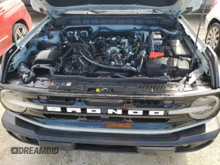 2021 Ford Bronco z VIN 1FMDE5CP4MLA65927, wystawiony jako Copart lot #74809974 z przebiegiem 41 296 mil mil oraz Nie do naprawy • Non repairable. Historia ofert i sprzedaży dostępna na DreamBid. Obrazek 12.
