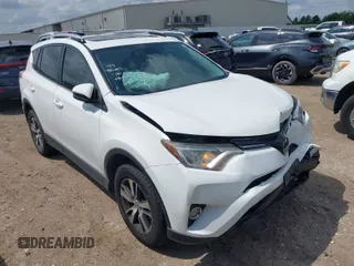 2017 Toyota RAV4 XLE with VIN JTMWFREV8HJ118885, listed as a IAAI auction lot 42097180 with 122,481 mi miles. Bid and sale history available at carsss.com. Image 1.