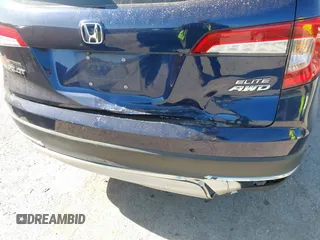 2020 Honda Pilot Elite with VIN 5FNYF6H02LB054348, listed as a IAAI auction lot 42302525 with 43,916 mi miles and . Bid and sale history available at DreamBid. Image 6.