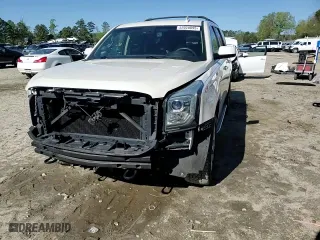 2015 GMC Yukon SLT with VIN 1GKS2BKC5FR646293, listed as a Copart auction lot 52020095 with 52,387 mi miles and Salvage Title. Bid and sale history available at carsss.com. Image 12.