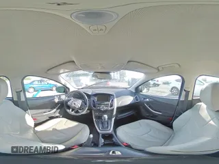 2015 Ford Focus Titanium z VIN 1FADP3N24FL262321, wystawiony jako Copart lot #59635525 z przebiegiem Nie podano mil oraz Szkoda całkowita • Salvage title. Historia ofert i sprzedaży dostępna na DreamBid. Obrazek 16.