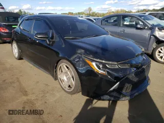 2022 Toyota Corolla Hatchback SE with VIN JTND4MBEXN3180370, listed as a Copart auction lot 74436644 with 57,563 mi miles and Salvage Title. Bid and sale history available at carsss.com. Image 4.