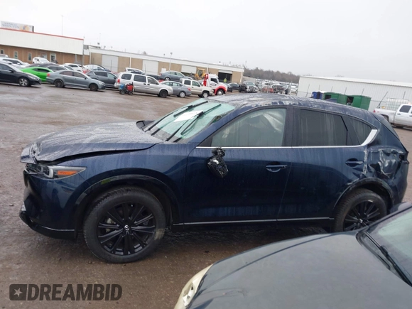 2022 Mazda CX-5 2.5 Turbo with VIN JM3KFBAY8N0635618, listed as a IAAI auction lot 41199038 with Not Provided miles and . Bid and sale history available at carsss.com. Image 14.