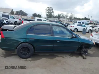 2001 Honda Civic LX with VIN JHMES16571S002955, listed as a IAAI auction lot 42128296 with 223,009 mi miles and . Bid and sale history available at DreamBid. Image 14.