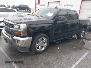 2017 Chevrolet Silverado 1500 LT with VIN 3GCPCREC9HG314864, listed as a IAAI auction lot 41798746 with 64,209 mi miles. Bid and sale history available at carsss.com. Image 2.