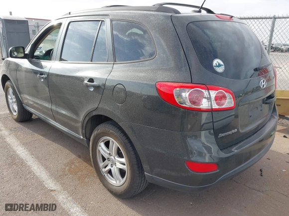2012 Hyundai Santa Fe GLS with VIN 5XYZG3AB2CG128873, listed as a IAAI auction lot 41874808 with 182,453 mi miles. Bid and sale history available at carsss.com. Image 3.