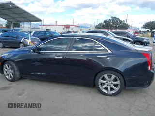 2013 Cadillac ATS z VIN 1G6AA5RX9D0167867, wystawiony jako IAAI lot #41945699 z przebiegiem 166 040 mil mil oraz . Historia ofert i sprzedaży dostępna na DreamBid. Obrazek 14.
