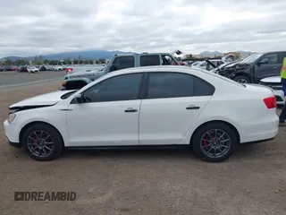 2014 Volkswagen Jetta S with VIN 3VW2K7AJ6EM233000, listed as a IAAI auction lot 41895391 with 130,692 mi miles and . Bid and sale history available at DreamBid. Image 14.