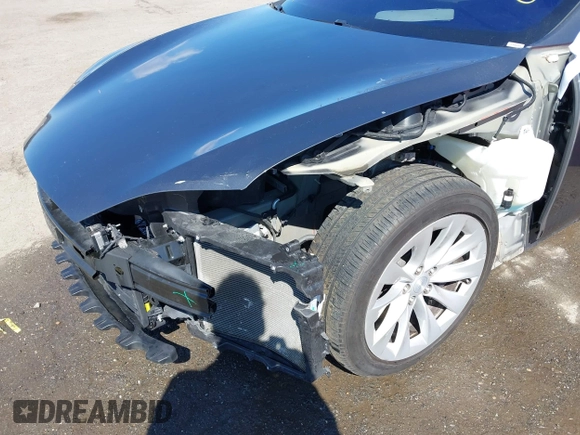 2017 Tesla Model S 100D with VIN 5YJSA1E22HF210635, listed as a IAAI auction lot 41854125 with 112,323 mi miles. Bid and sale history available at carsss.com. Image 6.