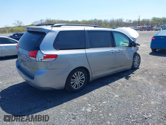 2013 Toyota Sienna XLE AAS with VIN 5TDYK3DC7DS299024, listed as a IAAI auction lot 42055130 with 349,520 mi miles. Bid and sale history available at carsss.com. Image 4.