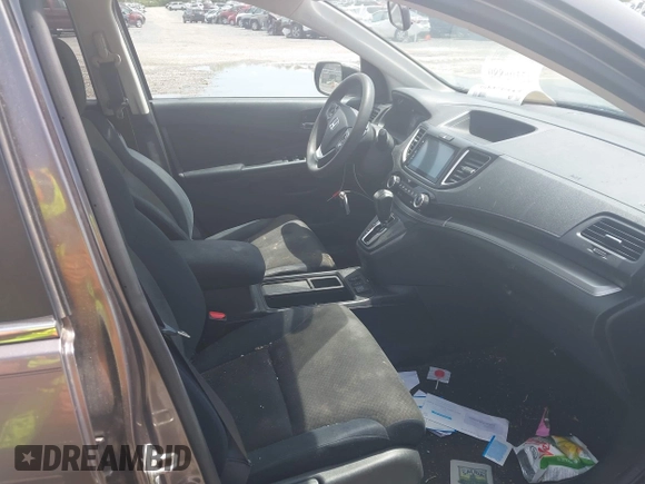 2016 Honda CR-V EX with VIN 2HKRM4H57GH652890, listed as a IAAI auction lot 42106880 with 118,422 mi miles and . Bid and sale history available at DreamBid. Image 5.
