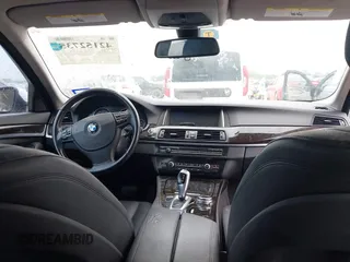 2014 BMW 5 Series 528i with VIN WBA5A5C5XED512045, listed as a IAAI auction lot 42152735 with 180,168 mi miles. Bid and sale history available at carsss.com. Image 17.