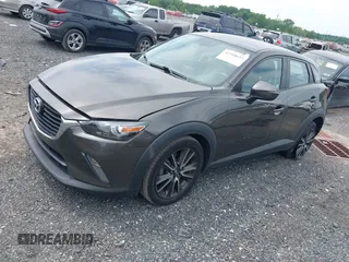 2017 Mazda CX-3 Touring z VIN JM1DKFC79H0162745, wystawiony jako IAAI lot #42318637 z przebiegiem 68 465 mil mil oraz . Historia ofert i sprzedaży dostępna na DreamBid. Obrazek 2.