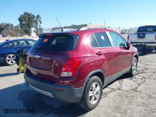 2016 Chevrolet Trax LT with VIN 3GNCJPSB2GL237398, listed as a IAAI auction lot 41293814 with 84,042 mi miles. Bid and sale history available at carsss.com. Image 4.