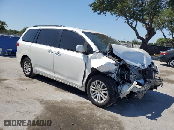 2015 Toyota Sienna XLE with VIN 5TDYK3DC1FS612491, listed as a Copart auction lot 53673815 with 169,306 mi miles and Salvage Title. Bid and sale history available at DreamBid. Image 4.