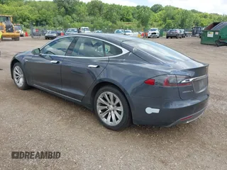 2016 Tesla Model S 90D with VIN 5YJSA1E25GF129482, listed as a IAAI auction lot 42588913 with 101,790 mi miles and . Bid and sale history available at DreamBid. Image 3.