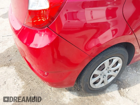 2013 Hyundai Accent GS z VIN KMHCT5AE3DU118162, wystawiony jako IAAI lot #42304964 z przebiegiem 144 815 mil mil oraz . Historia ofert i sprzedaży dostępna na DreamBid. Obrazek 12.