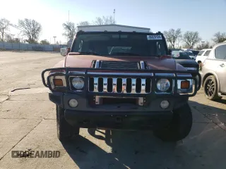 2004 Hummer H2 with VIN 5GRGN23U24H101928, listed as a Copart auction lot 86820104 with 197,079 mi miles and Salvage Title. Bid and sale history available at carsss.com. Image 5.