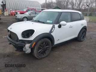 2012 MINI Countryman S with VIN WMWZC5C52CWM12275, listed as a IAAI auction lot 42014546 with 147,494 mi miles and . Bid and sale history available at DreamBid. Image 2.