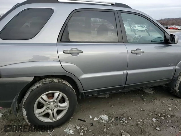 2005 Kia Sportage LX with VIN KNDJE723X57064082, listed as a Copart auction lot 86177214 with Not Provided miles and Salvage Title. Bid and sale history available at carsss.com. Image 11.