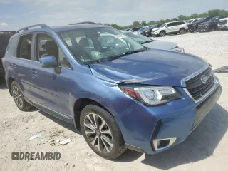 2017 Subaru Forester Touring with VIN JF2SJGTC2HH404923, listed as a Copart auction lot 58091885 with 101,317 mi miles and Salvage title. Bid and sale history available at DreamBid. Image 4.
