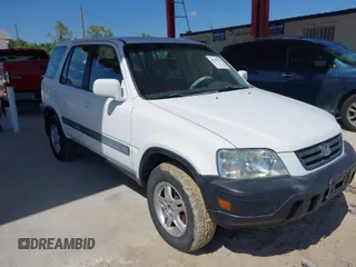 1999 Honda CR-V EX with VIN JHLRD1860XC037846, listed as a IAAI auction lot 42037921 with 164,477 mi miles. Bid and sale history available at carsss.com. Image 1.