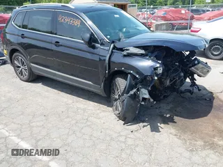 2019 Volkswagen Tiguan SE with VIN 3VV2B7AX1KM083608, listed as a IAAI auction lot 42343384 with 77,438 mi miles and . Bid and sale history available at DreamBid. Image 1.