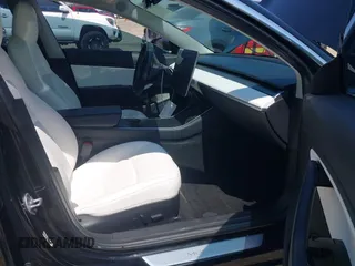 2018 Tesla Model 3 Long Range Battery with VIN 5YJ3E1EB1JF122786, listed as a IAAI auction lot 42010451 with 85,510 mi miles and . Bid and sale history available at DreamBid. Image 5.