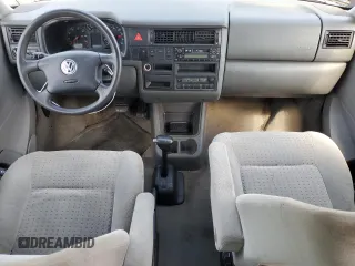 2003 Volkswagen EuroVan MV с VIN WV2MB47023H044047, выставлен на аукционе Copart как лот 71014624 с пробегом 189 485 миль миль и Чистый • Clean title. История ставок и продаж доступна на DreamBid. Изображение 8.
