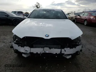 2024 BMW 5 Series 530i with VIN WBA43FJ0XRCS14707, listed as a Copart auction lot 84764324 with 7,409 mi miles and Salvage Title. Bid and sale history available at carsss.com. Image 5.