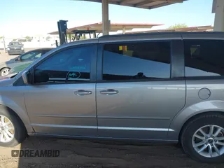 2016 Dodge Grand Caravan SXT with VIN 2C4RDGCG9GR323668, listed as a IAAI auction lot 42025601 with 125,351 mi miles and . Bid and sale history available at DreamBid. Image 14.