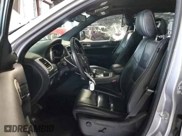 2015 Jeep Grand Cherokee High Altitude with VIN 1C4RJECG7FC781715, listed as a Copart auction lot 73321744 with 0 mi miles and Salvage Title. Bid and sale history available at carsss.com. Image 7.