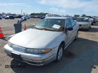 2003 Oldsmobile Alero GL1 with VIN 1G3NL52F33C218996, listed as a IAAI auction lot 41548938 with 75,639 mi miles and . Bid and sale history available at DreamBid. Image 2.