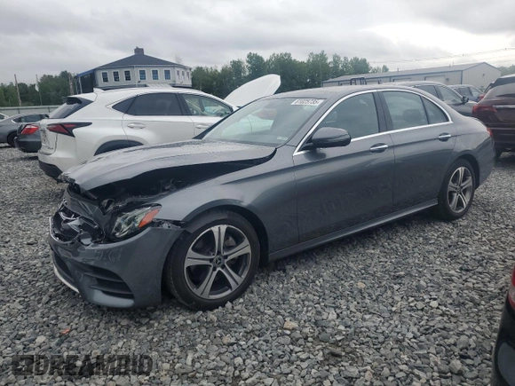 2019 Mercedes-Benz E 300 with VIN WDDZF4KB7KA553856, listed as a Copart auction lot 61025735 with 59,001 mi miles and Salvage title. Bid and sale history available at DreamBid. Image 1.