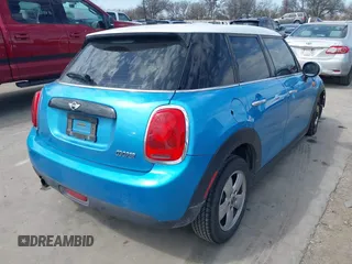 2017 MINI Hardtop 4 Door Cooper with VIN WMWXU1C53H2E17614, listed as a IAAI auction lot 41686204 with 53,409 mi miles and . Bid and sale history available at DreamBid. Image 4.
