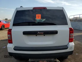 2014 Jeep Patriot Sport with VIN 1C4NJPBB9ED912846, listed as a Copart auction lot 58866985 with 191,195 mi miles and Salvage title. Bid and sale history available at DreamBid. Image 6.