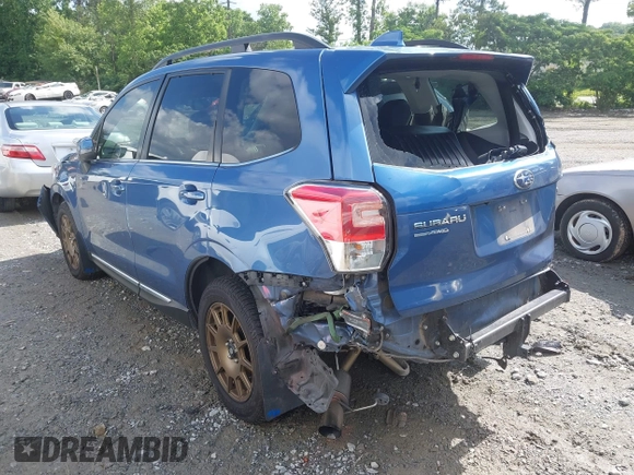 2017 Subaru Forester Touring with VIN JF2SJGWC2HH467144, listed as a IAAI auction lot 42319496 with 122,845 mi miles and . Bid and sale history available at DreamBid. Image 3.